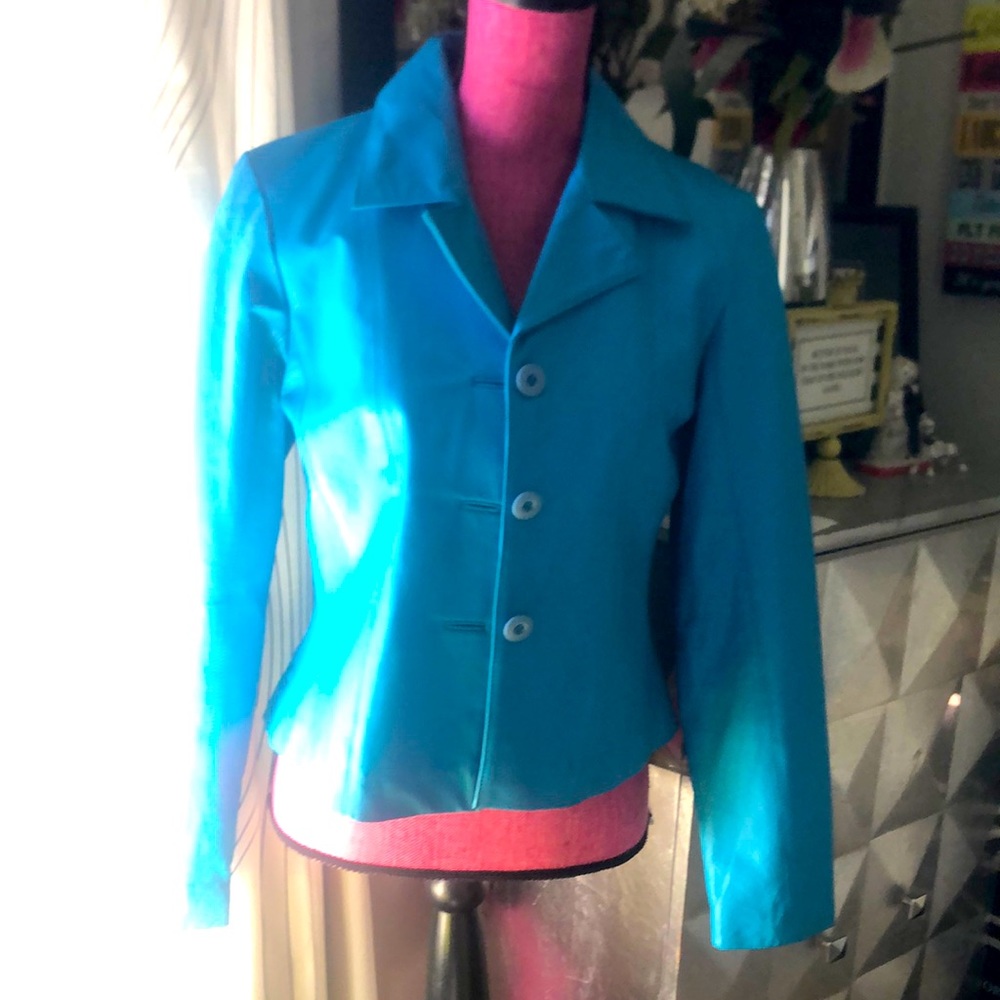 Wilson’s Turquoise leather jacket